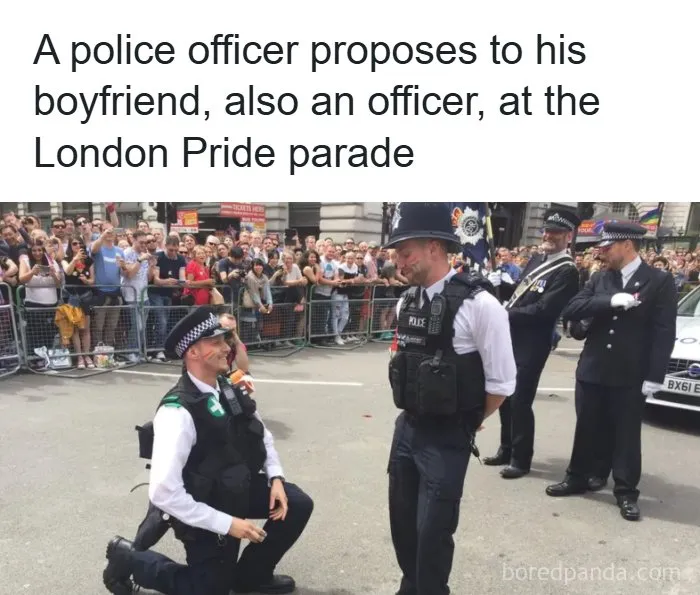 A police officer proposing to his officer boyfriend at a parade, representing interesting facts about the world