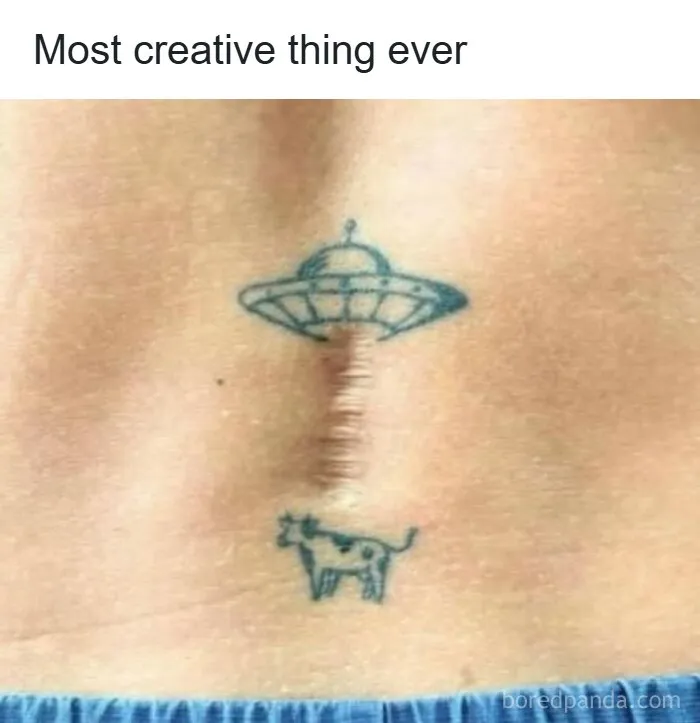 Creative tattoo incorporating a surgical scar into a UFO abducting a cow from interesting photos