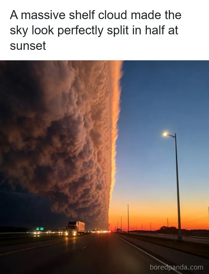 Massive shelf cloud splitting the sky on a highway, featured as one of the entertaining posts on social media.