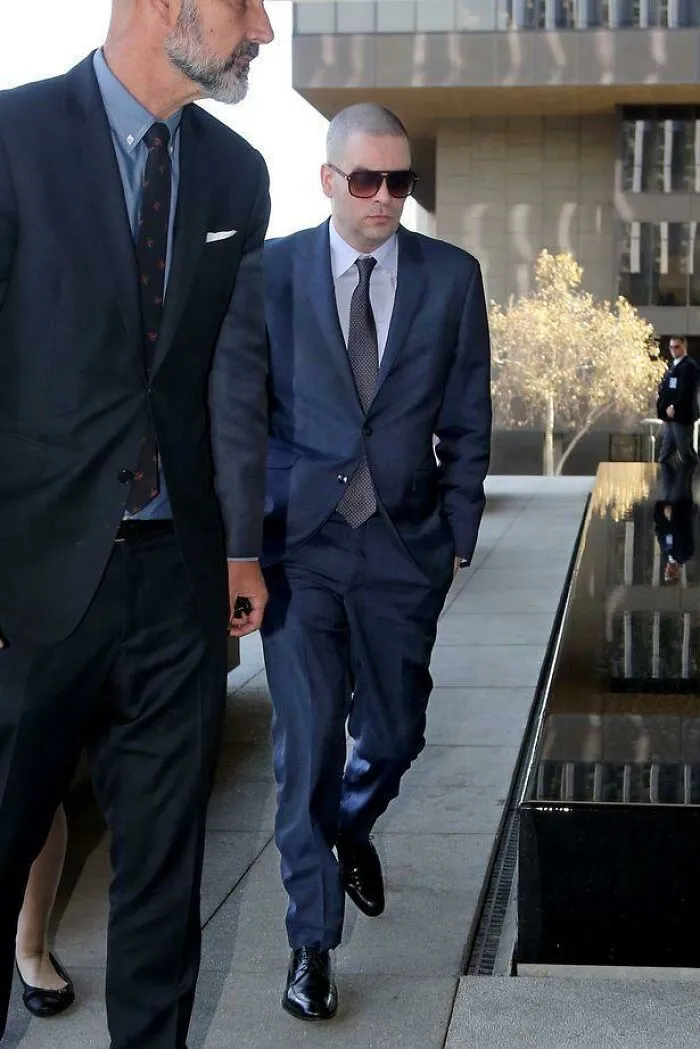 Aaron Hernandez wearing a suit captured in photos for the last time.