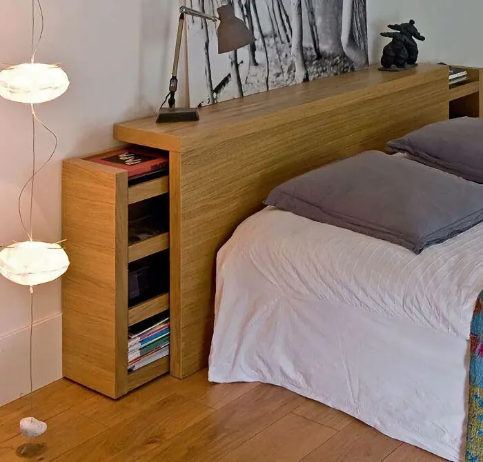 Smart bed headboard with pull-out storage, part of clever wooden creations