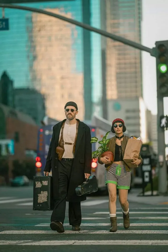 A man and woman dressed as Leon the Professional characters for funny cool Halloween couples costumes.
