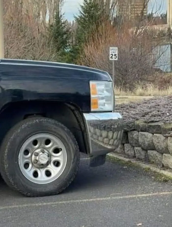 Reflection on a car bumper looking like teeth, showing how photos can make your eyes play tricks