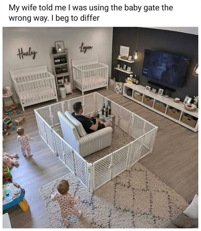 A dad sitting in a baby gate enclosure playing video games, representing edgy memes about parenting.