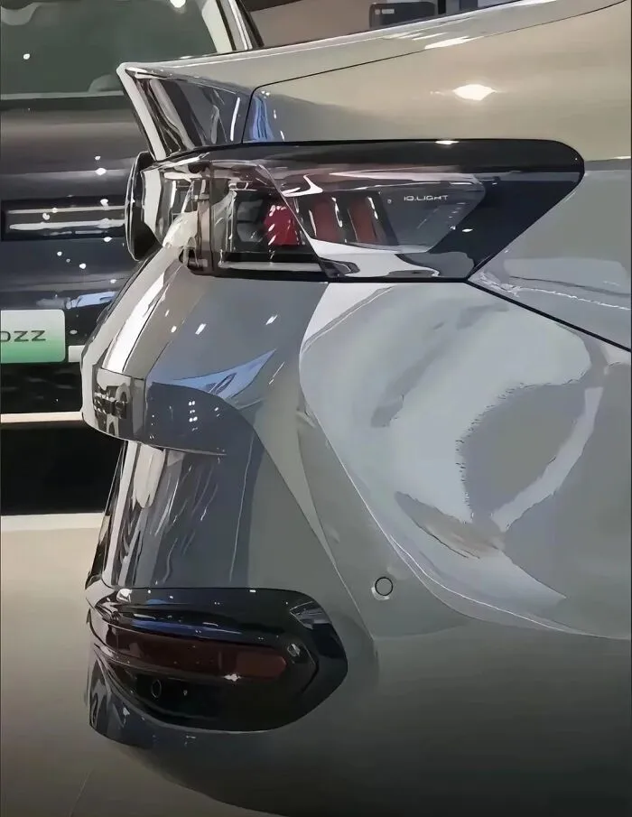 Close-up photo of a car rear light showing an optical illusion that resembles a face