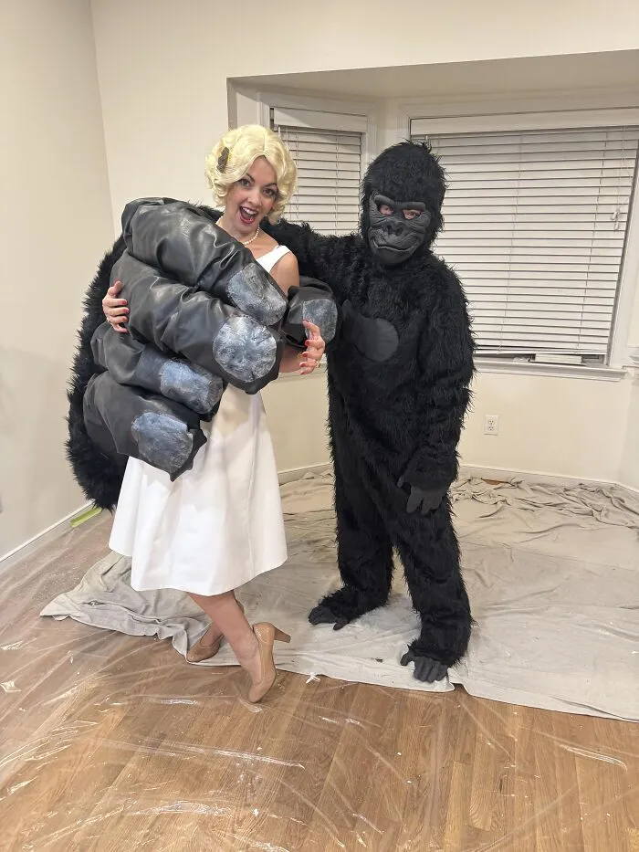 A couple dressed up as King Kong and Ann Darrow for funny cool Halloween couples costumes.