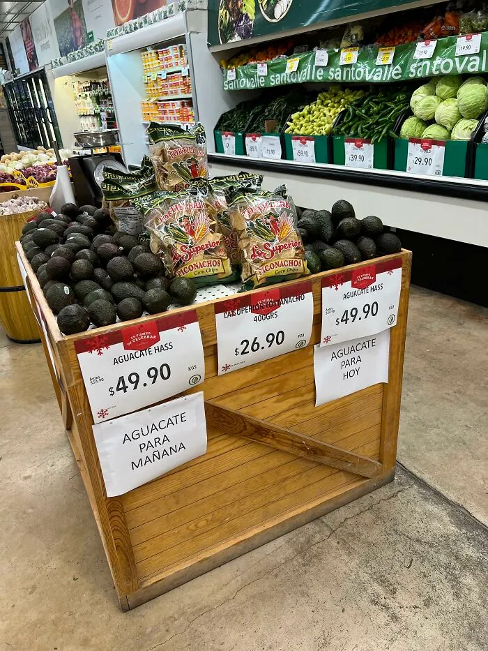 Ingenious things in supermarket: avocados separated by ripeness into today and tomorrow bins.