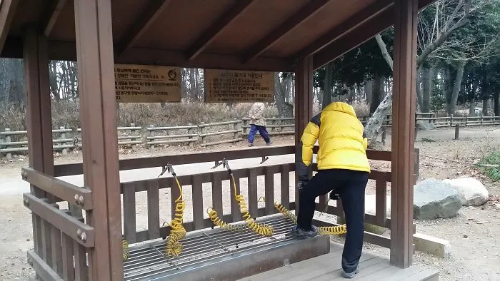 Public shoe dusting station with air hoses, an ingenious thing in various parts of the world.