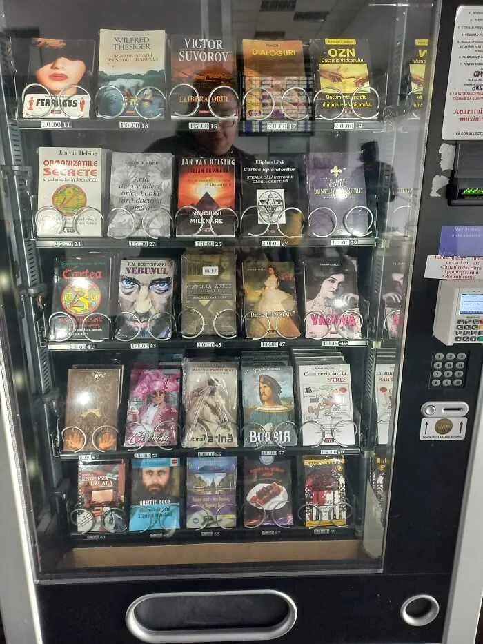 A book vending machine in Romania displaying various titles, showcasing ingenious things around the world.