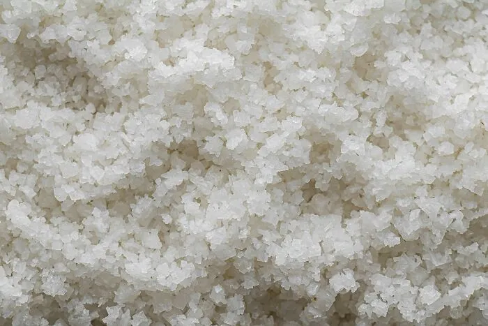 Close-up of coarse sea salt crystals texture