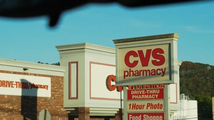 Exterior sign of a CVS Pharmacy, useful for brilliant tips on saving money on prescriptions.