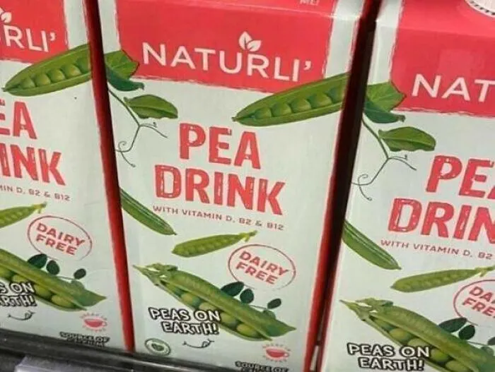 Cartons of Naturli Pea Drink, highlighting unintended humor in plant-based milk advertising fails.