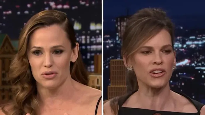 Celebrity lookalikes Jennifer Garner and Hilary Swank posing similarly during interviews