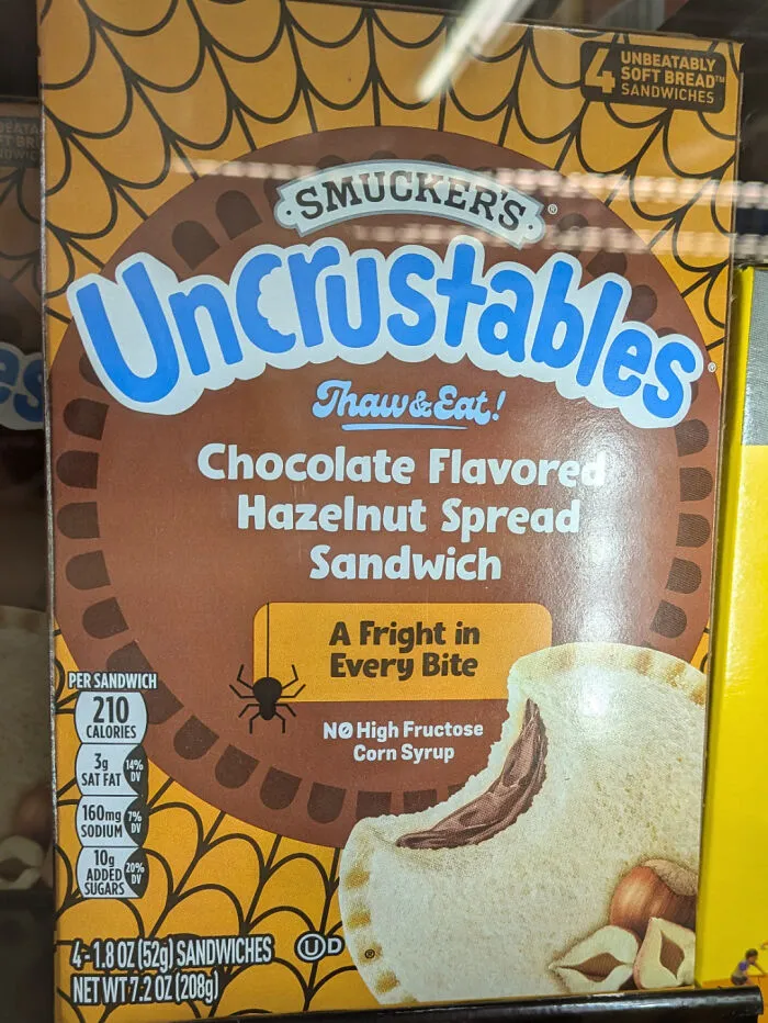 A box of Uncrustables stating A Fright in Every Bite, illustrating weird food advertising fails.