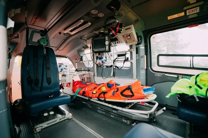 Interior of an ambulance showing a medical stretcher, debunking Hollywood movie rescue stereotypes.