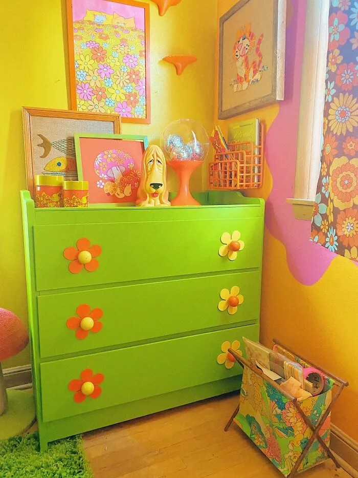 A vibrant green dresser in a colorful room as part of a home makeover project