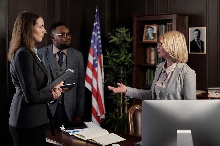 Lawyers discussing unusual real laws in a formal US court office setting