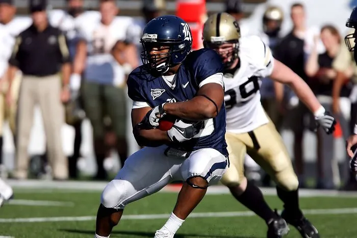 An American football player running with the ball, relating to obvious lies.
