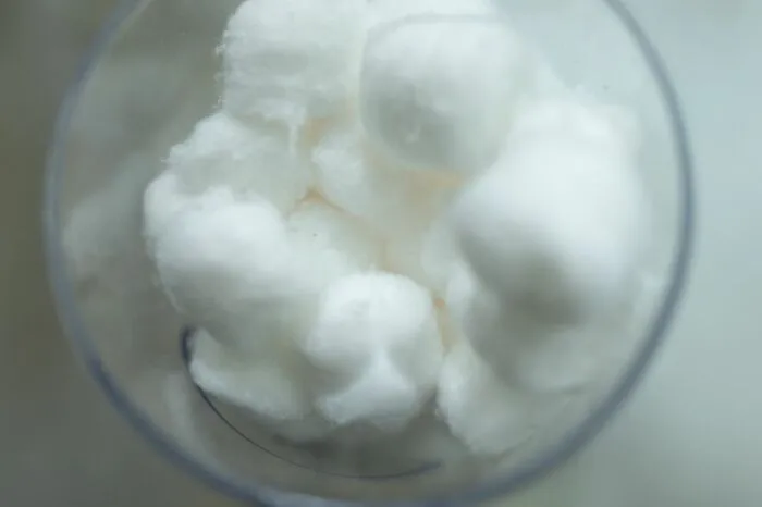 Cotton balls in transparent container for practical life hacks