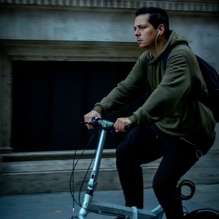 A man riding a bicycle outdoors, related to chilling stories of people trusting their gut feeling.