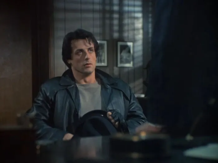 Sylvester Stallone as Rocky Balboa, portraying positive masculinity and emotional strength