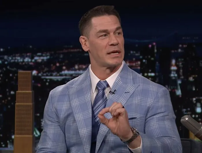 John Cena speaking passionately, demonstrating positive masculinity through emotional openness.