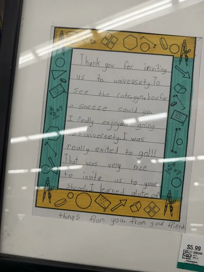 A framed handwritten thank you note from a student, an instance of found paper.