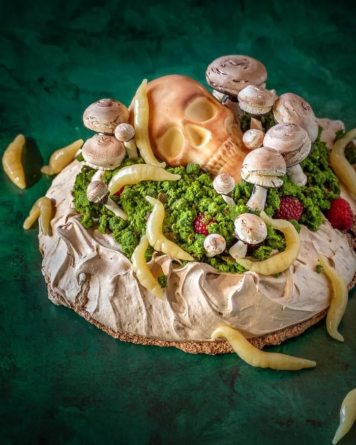 Creepy skull, mushroom, and worm dessert for Halloween foods.