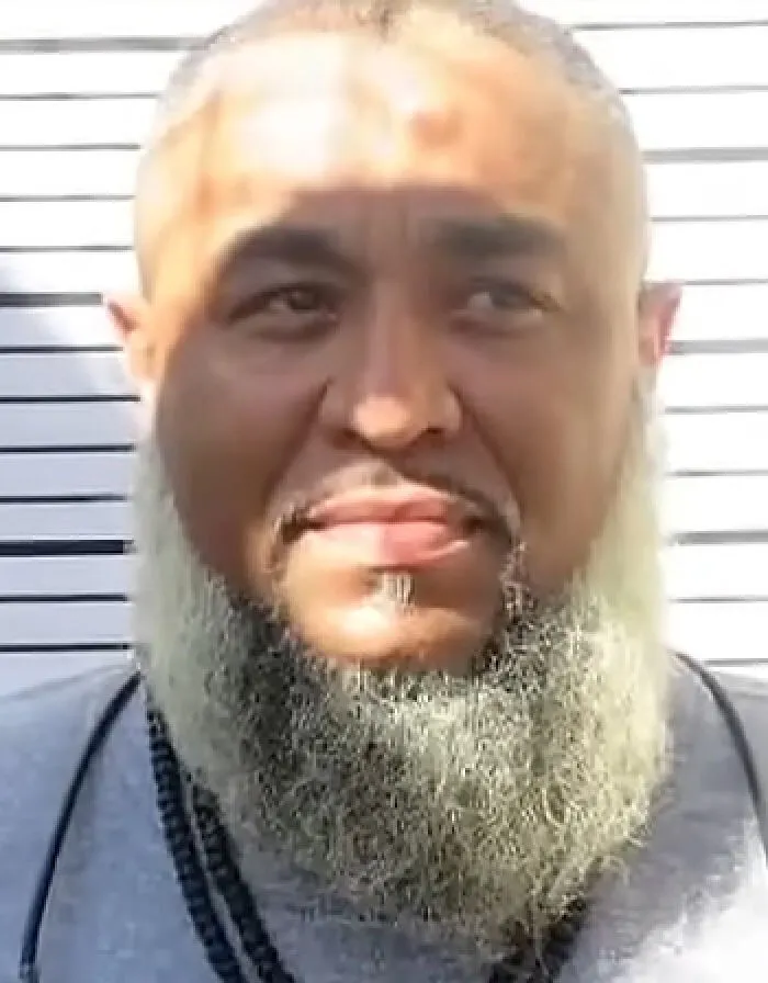 Mugshot of a bearded man, one of the few who survived lethal injection.