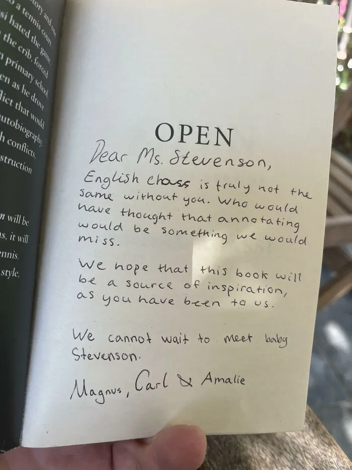 A handwritten note to a teacher inside a book, an example of found paper.