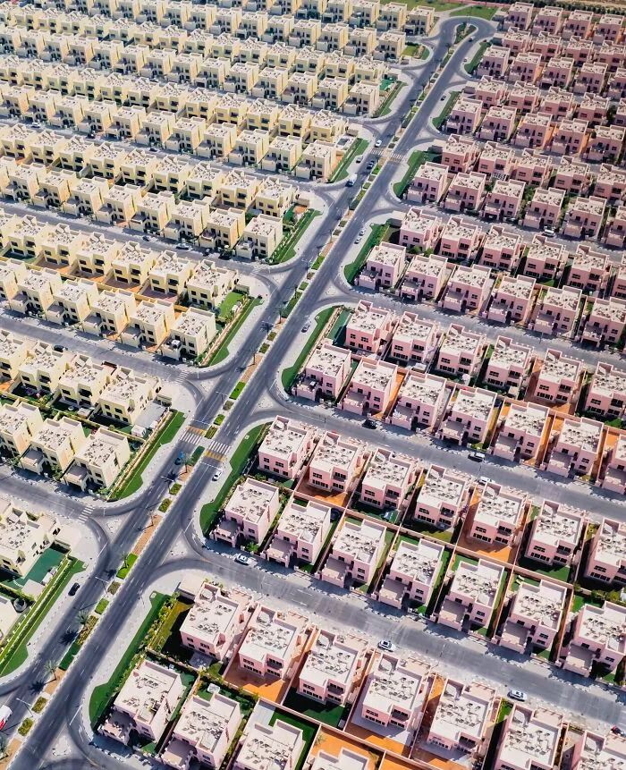 Aerial view of a sprawling residential development of buildings and spaces, from The Perspa Awards 2026.