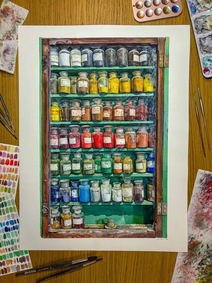 Paleta de colores y pinturas para creaciones geniales con frascos organizados en estantes