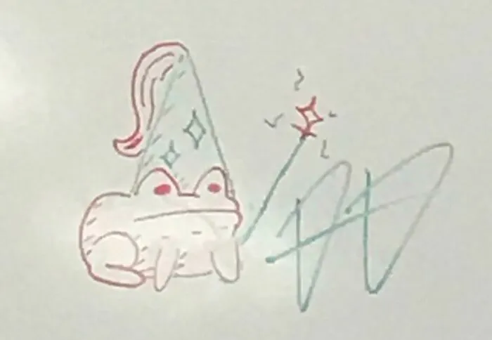 Dibujo en pizarra blanca de una rana mago como parte de imágenes reconfortantes