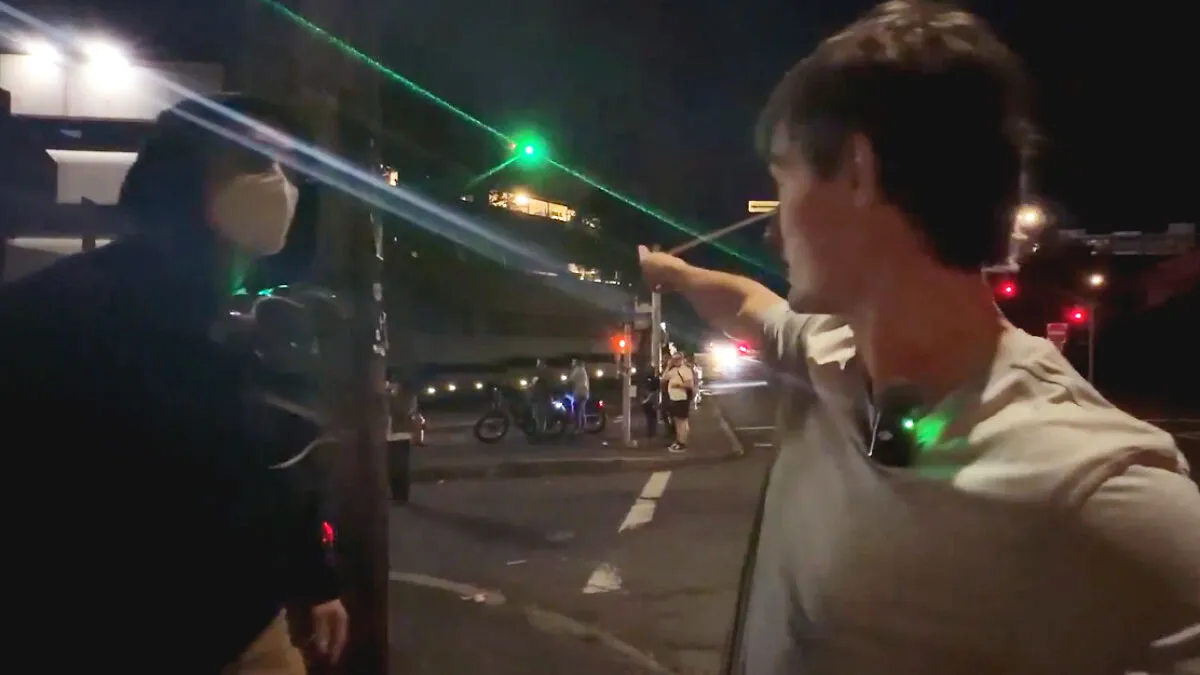Video Shows DHS Snipers Allegedly Aiming Lasers At Antifa Member Threatening Reporter In Portland