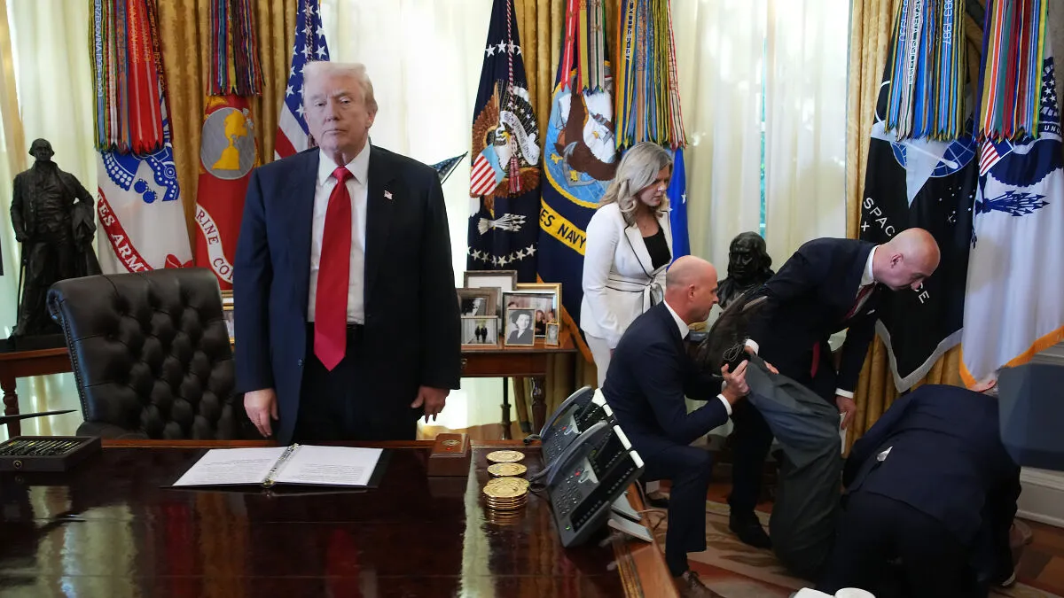 Donald Trump's Face Is Priceless After Man Faints Right Behind Him